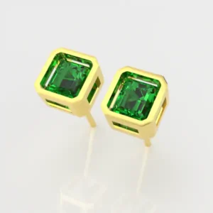 boxed plugs matched emeralds earrings