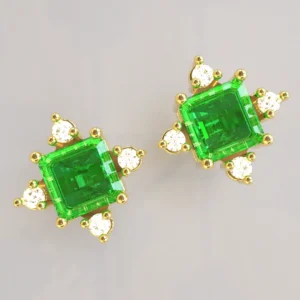 plug earrings gold emerald